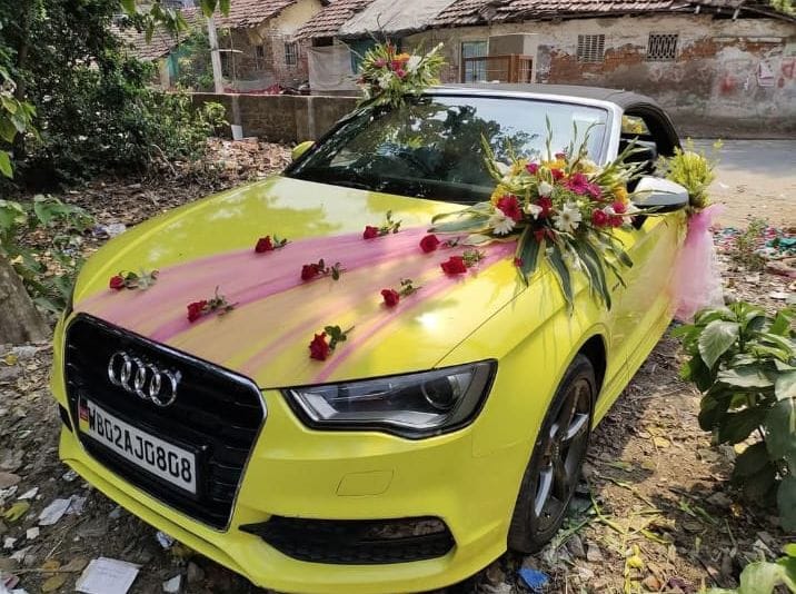 Bright Yellow Audi – Floral Ribbon Wedding Decoration